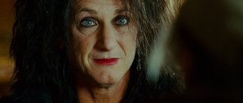 Movie still from “This Must Be the Place” (2011), directed by Paolo Sorrentino – An older woman with blue eyes looking at the camera; Close Up shot, High angle