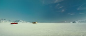 Movie still from “This Must Be the Place” (2011), directed by Paolo Sorrentino – A bus in the middle of a snow covered field; Extreme Wide shot, Low angle