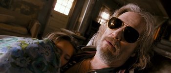 Movie still from “Tideland” (2005), directed by Terry Gilliam – A man and a woman sleeping on a bed; Close Up shot, Low angle