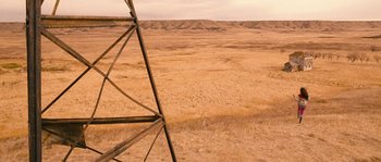 Movie still from “Tideland” (2005), directed by Terry Gilliam – A view of a desert from the top of an electrical tower; Extreme Wide shot, High angle