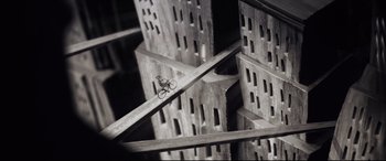 Movie still from “Tigers Are Not Afraid” (2017), directed by Issa López – A bicycle sitting on top of a wooden structure; Extreme Wide shot, High angle
