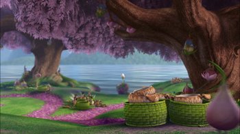 Movie still from “Tinker Bell” (2008), directed by Bradley Raymond – Baskets of food on the grass near the water; Wide shot, Low angle