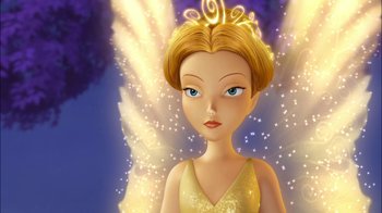 Movie still from “Tinker Bell” (2008), directed by Bradley Raymond – A fairy with a yellow dress and a gold crown on her head; Close Up shot, Low angle