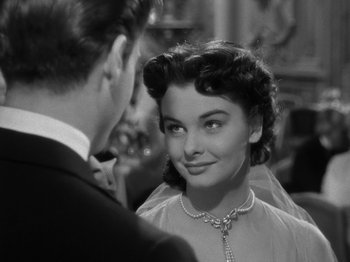 Movie still from “Titanic” (1953), directed by Jean Negulesco – A man and a woman are looking at one another; Close Up shot, Over the shoulder angle