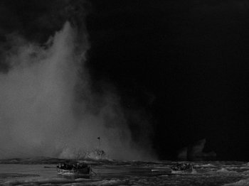 Movie still from “Titanic” (1953), directed by Jean Negulesco – A black - and - white photo of a body of water; Extreme Wide shot, High angle