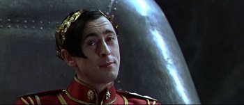 Movie still from “Titus” (1999), directed by Julie Taymor – A person wearing a uniform; Close Up shot, High angle