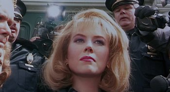 Movie still from “To Die For” (1995), directed by Gus Van Sant – A person wearing a hat; Close Up shot, Low angle