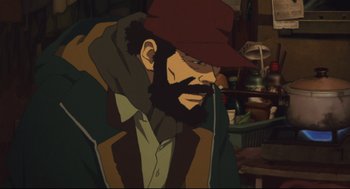 Movie still from “Tokyo Godfathers” (2003), directed by Shôgo Furuya – An animated picture of a man with a beard and a hat; Close Up shot, High angle