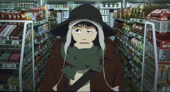 Movie still from “Tokyo Godfathers” (2003), directed by Shôgo Furuya – A woman in a hat and scarf in a grocery store; Close Up shot, Low angle