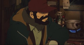 Movie still from “Tokyo Godfathers” (2003), directed by Shôgo Furuya – An animated man with a beard wearing a red hat; Close Up shot, High angle