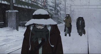 Movie still from “Tokyo Godfathers” (2003), directed by Shôgo Furuya – A group of people walking down a street in the snow; Wide shot, Low angle