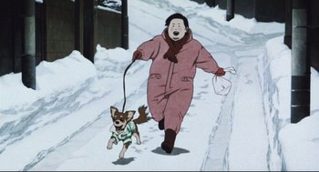 Movie still from “Tokyo Godfathers” (2003), directed by Shôgo Furuya – A man walking a dog on a leash; Wide shot, Low angle