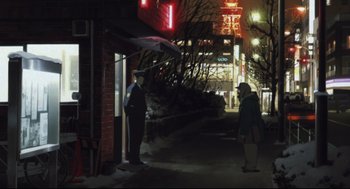 Movie still from “Tokyo Godfathers” (2003), directed by Shôgo Furuya – Two people standing on a sidewalk at night; Wide shot, Low angle