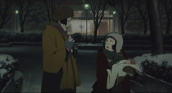 Movie still from “Tokyo Godfathers” (2003), directed by Shôgo Furuya – A man and a woman are standing in the dark; Medium shot, High angle