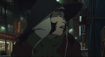 Movie still from “Tokyo Godfathers” (2003), directed by Shôgo Furuya – A person with a hat and a scarf on; Close Up shot, Low angle