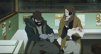 Movie still from “Tokyo Godfathers” (2003), directed by Shôgo Furuya – Two people sitting on a bench looking at a phone; Medium shot, High angle