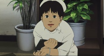 Movie still from “Tokyo Godfathers” (2003), directed by Shôgo Furuya – An animated picture of a young boy holding a book; Close Up shot, High angle