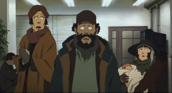 Movie still from “Tokyo Godfathers” (2003), directed by Shôgo Furuya – A man with a beard is looking at the camera while two other people look on; Medium shot, Low angle