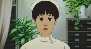 Movie still from “Tokyo Godfathers” (2003), directed by Shôgo Furuya – An animated picture of a person wearing a nurse's uniform; Close Up shot, Low angle