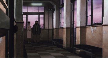 Movie still from “Tokyo Godfathers” (2003), directed by Shôgo Furuya – Two people are standing in an empty room; Wide shot, Low angle