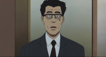 Movie still from “Tokyo Godfathers” (2003), directed by Shôgo Furuya – A man in a suit and tie with glasses on; Close Up shot, Low angle