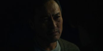 Movie still from “Tokyo Vice” (2022), created by J.T. Rogers – A person looking at the camera; Close Up shot, Over the shoulder angle