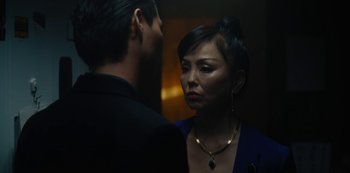 Movie still from “Tokyo Vice” (2022), created by J.T. Rogers – A man and a woman are looking at one another; Close Up shot, Over the shoulder angle