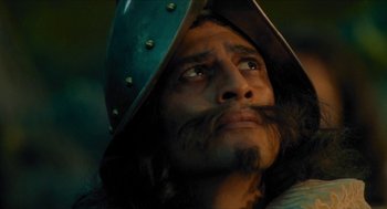 Movie still from “Tom Thumb” (2001), directed by Olivier Dahan – A person wearing a helmet; Close Up shot, Low angle