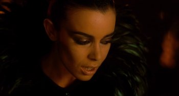 Movie still from “Tom Thumb” (2001), directed by Olivier Dahan – A person wearing makeup on their face; Close Up shot, Low angle