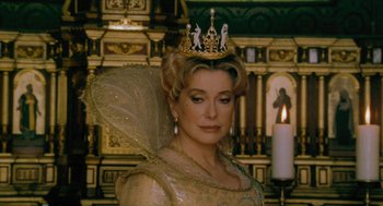 Movie still from “Tom Thumb” (2001), directed by Olivier Dahan – A woman with a tiara on her head; Close Up shot, Low angle