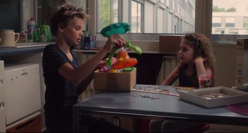 Movie still from “Tomboy” (2011), directed by Céline Sciamma – A boy and a little girl are playing a game; Medium shot, Over the shoulder angle