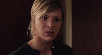 Movie still from “Tomboy” (2011), directed by Céline Sciamma – A person wearing a black shirt; Close Up shot, Over the shoulder angle