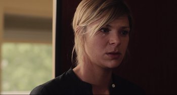 Movie still from “Tomboy” (2011), directed by Céline Sciamma – A person wearing a black shirt; Close Up shot, Over the shoulder angle