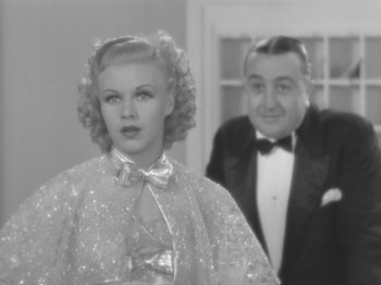 Movie still from “Top Hat” (1935), directed by Mark Sandrich – An old black and white photo of a man and a woman; Close Up shot, Over the shoulder angle