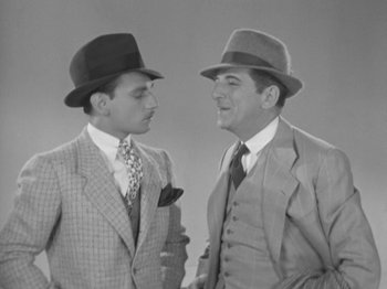 Movie still from “Top Hat” (1935), directed by Mark Sandrich – A couple of men standing next to each other; Medium shot, High angle