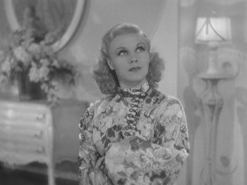 Movie still from “Top Hat” (1935), directed by Mark Sandrich – An old photo of a woman standing in front of a mirror; Close Up shot, High angle