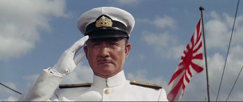 Movie still from “Tora! Tora! Tora!” (1970), directed by Kinji Fukasaku – A person wearing a uniform; Medium shot, Low angle