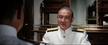 Movie still from “Tora! Tora! Tora!” (1970), directed by Kinji Fukasaku – A person wearing a uniform; Medium shot, Low angle