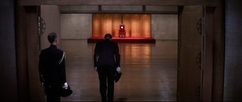 Movie still from “Tora! Tora! Tora!” (1970), directed by Kinji Fukasaku – A man standing in front of an empty stage; Extreme Wide shot, High angle