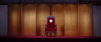 Movie still from “Tora! Tora! Tora!” (1970), directed by Kinji Fukasaku – A chair with a clock on the back of it; Extreme Wide shot, Low angle