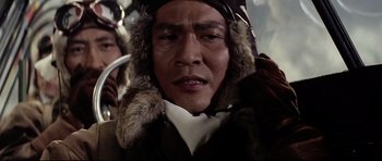 Movie still from “Tora! Tora! Tora!” (1970), directed by Kinji Fukasaku – An older man wearing a hat and a fur coat; Close Up shot, Low angle