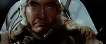 Movie still from “Tora! Tora! Tora!” (1970), directed by Kinji Fukasaku – A person wearing a fur hat; Close Up shot, Low angle