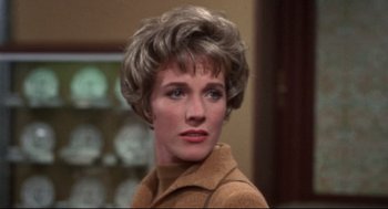 Movie still from “Torn Curtain” (1966), directed by Alfred Hitchcock – A person with short hair; Close Up shot, Over the shoulder angle