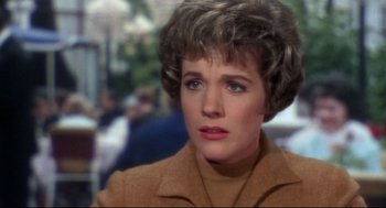 Movie still from “Torn Curtain” (1966), directed by Alfred Hitchcock – A person wearing a jacket; Close Up shot, Over the shoulder angle