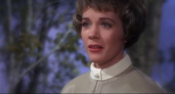 Movie still from “Torn Curtain” (1966), directed by Alfred Hitchcock – A person with short hair wearing a white shirt; Close Up shot, High angle