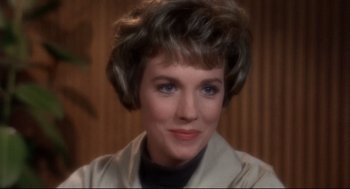Movie still from “Torn Curtain” (1966), directed by Alfred Hitchcock – A person with short hair; Close Up shot, Over the shoulder angle