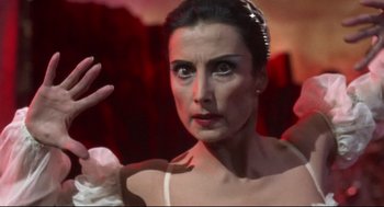 Movie still from “Torn Curtain” (1966), directed by Alfred Hitchcock – A person wearing a dress; Close Up shot, Low angle