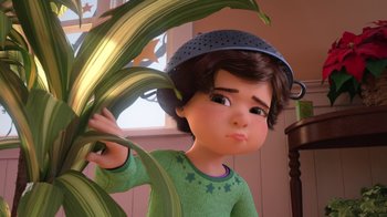 Movie still from “Toy Story That Time Forgot” (2014), directed by Steve Purcell – A cartoon of a girl with a hat on her head looking at a plant; Close Up shot, Low angle