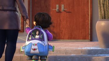 Movie still from “Toy Story That Time Forgot” (2014), directed by Steve Purcell – A little girl is holding her hand out to her dad; Medium shot, Over the shoulder angle