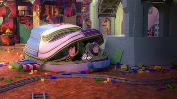 Movie still from “Toy Story That Time Forgot” (2014), directed by Steve Purcell – Two toy story characters in a toy story case; Extreme Wide shot, High angle